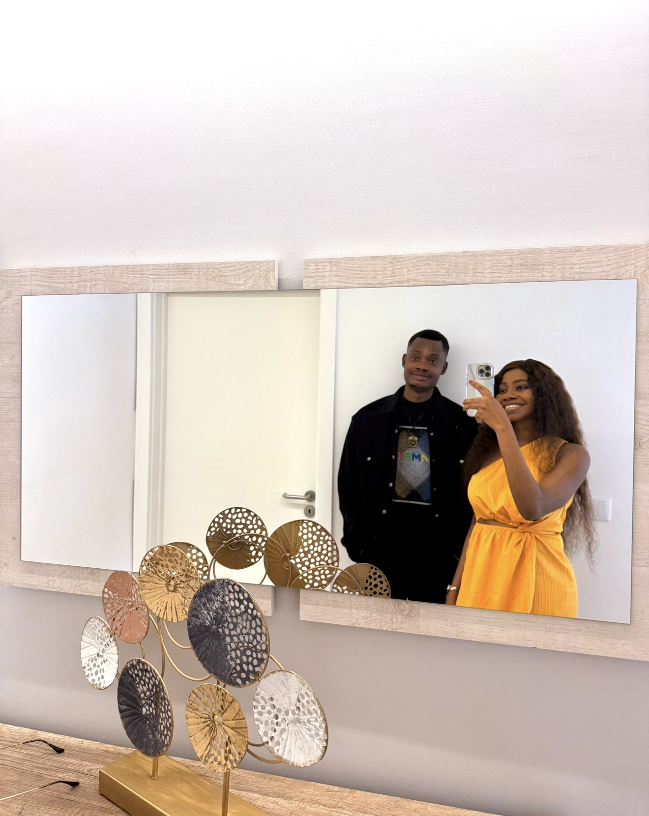 Oluwasefunmi and Olanrewaju mirror selfie